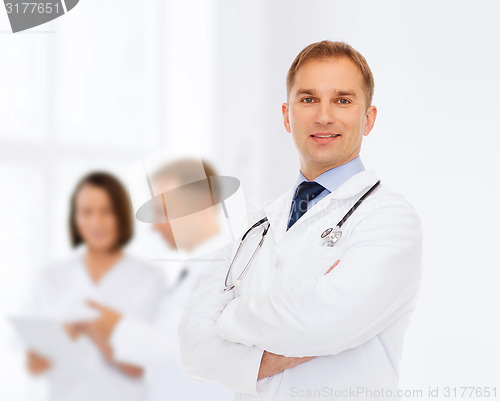 Image of smiling male doctor with stethoscope