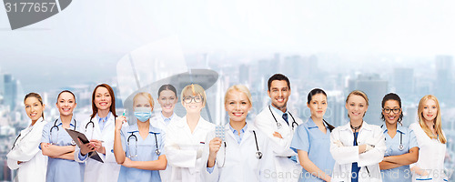Image of smiling doctors and nurses with stethoscope