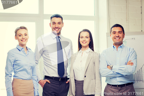 Image of happy business team in office