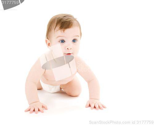 Image of crawling curious baby