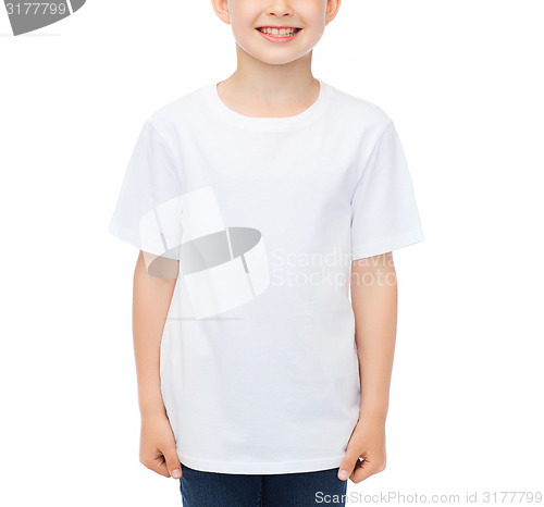Image of smiling little boy in white blank t-shirt