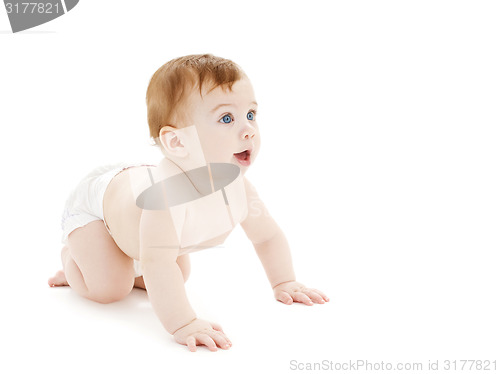 Image of crawling curious baby