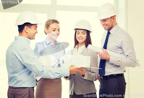 Image of happy business team in office