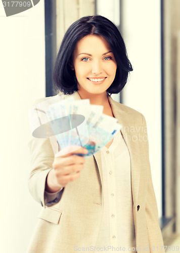 Image of lovely woman with euro cash money