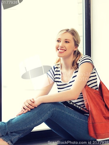 Image of happy and smiling teenage girl