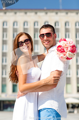 Image of smiling couple in city