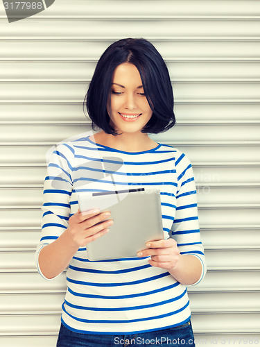 Image of happy woman with tablet pc computer