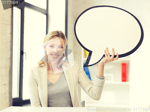 Image of smiling businesswoman with blank text bubble