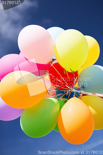 Image of lots of colorful balloons in the sky