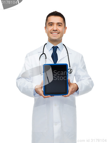 Image of smiling male doctor with tablet pc