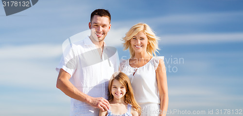 Image of happy family with blue sky