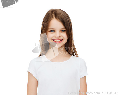 Image of smiling little girl in white blank t-shirt