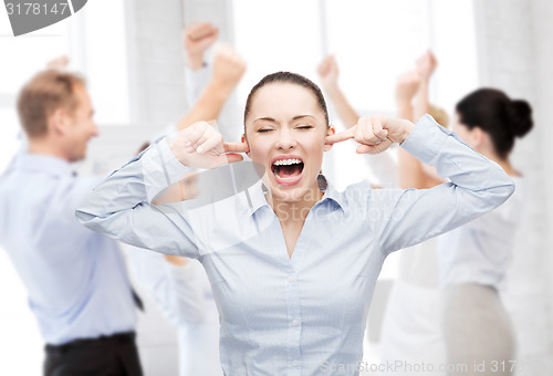 Image of angry screaming businesswoman