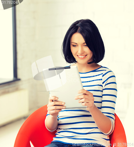 Image of happy teenage girl with tablet pc computer