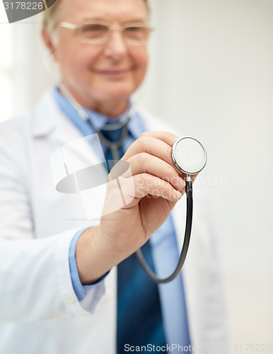 Image of close up of doctor in white coat with stethoscope