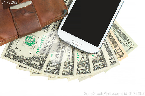 Image of cellphone and money on white