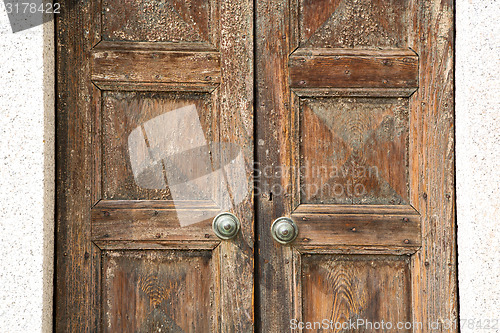 Image of santo an in a  door curch  closed wood lombardy italy  varese