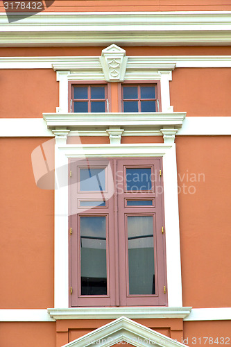 Image of window   in  gold    temple    bangkok  orange