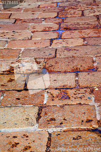 Image of busto arsizio  street  abstract   pavement of a curch and marble
