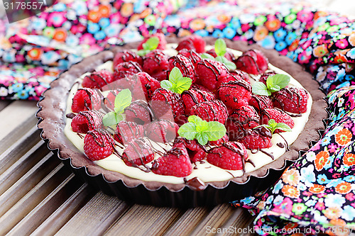 Image of tart with raspberries