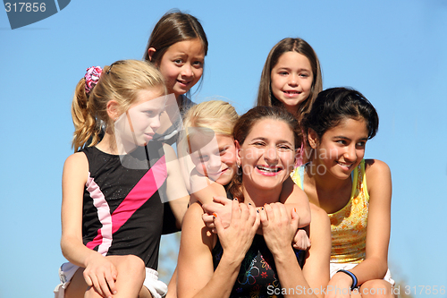 Image of Woman and five girls