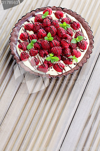 Image of tart with raspberries