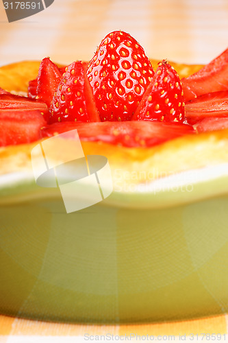 Image of Strawberry and custard tart close-up