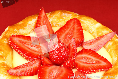 Image of Strawberry and custard tart close-up