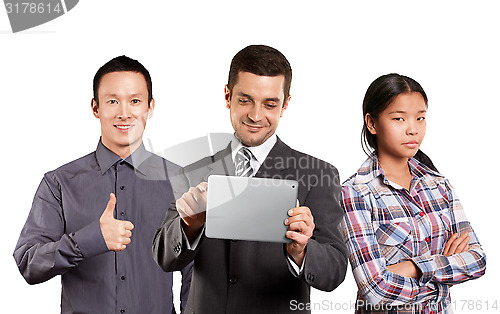 Image of Asian team and Businessman With Touch Pad