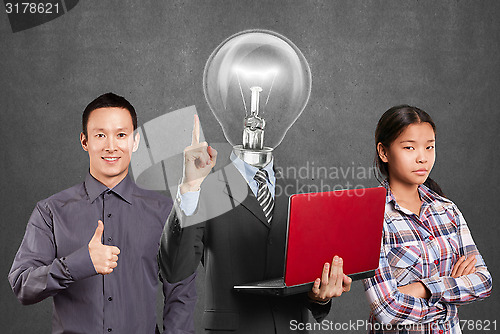 Image of Asian team and Lamp Head Man And Business Team 