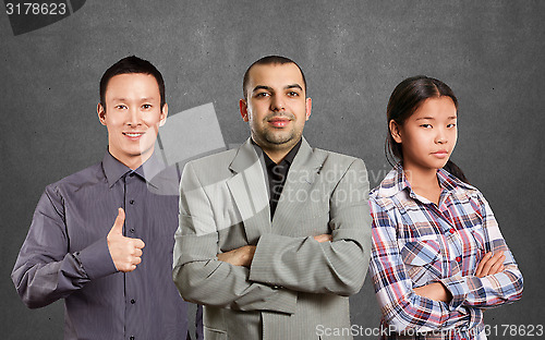 Image of Asian team and male in suit