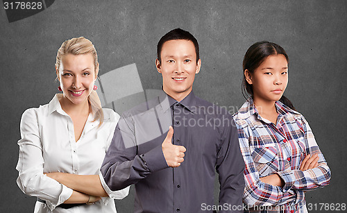Image of Asian team and Young Businesswoman