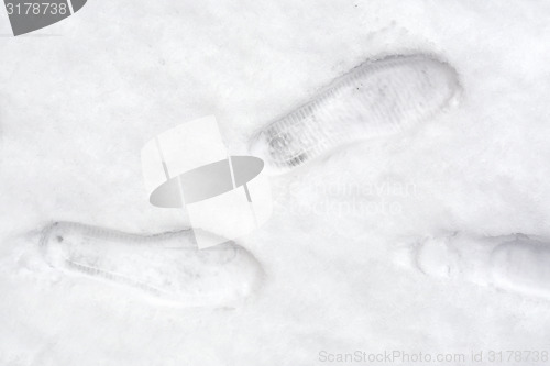 Image of Tracks from boot a man in snow