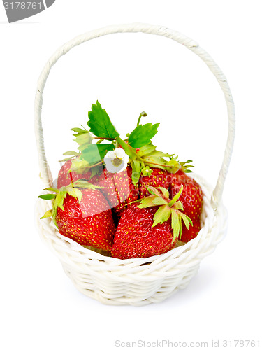 Image of Strawberry in wicker basket with leaves