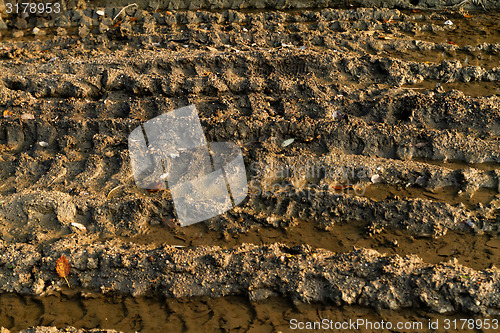 Image of Dirty broken rural road 