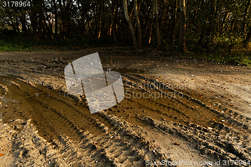 Image of Dirty broken rural road 