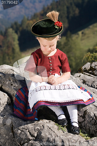 Image of Little girls in Bavarian pray