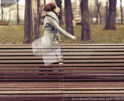 Image of Two women in the rainy park