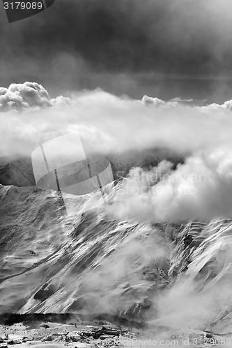 Image of Black and white view on ski resort in mist