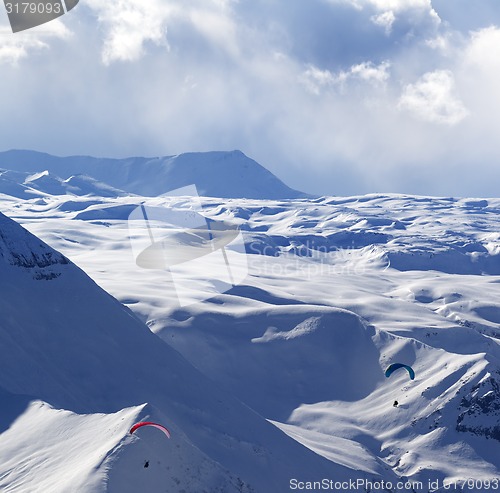 Image of Speed flying in winter mountains