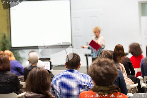 Image of Woman lecturing at university.