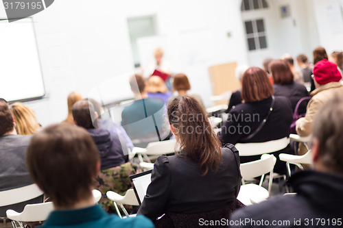 Image of Woman lecturing at university.