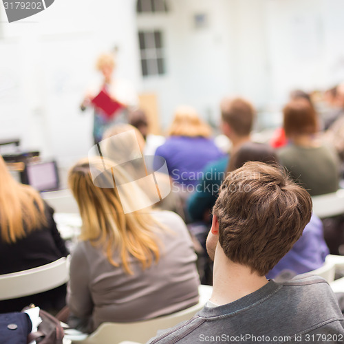 Image of Woman lecturing at university.