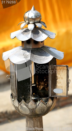 Image of Beautiful candlestick with burning candle