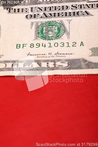 Image of american dollars on american flag