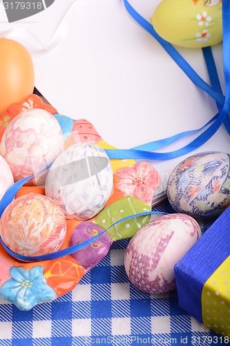 Image of Easter setting with gift box and spring decoration