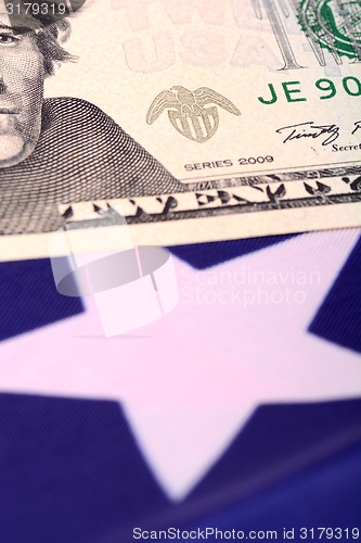 Image of american dollars on american flag