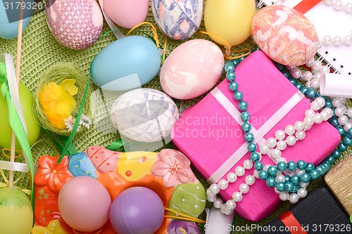 Image of Easter setting with gift box and spring decoration