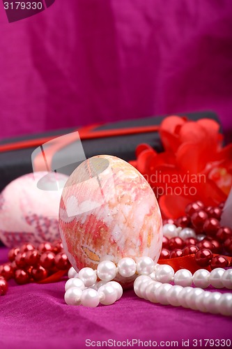 Image of Easter setting with gift box and spring decoration