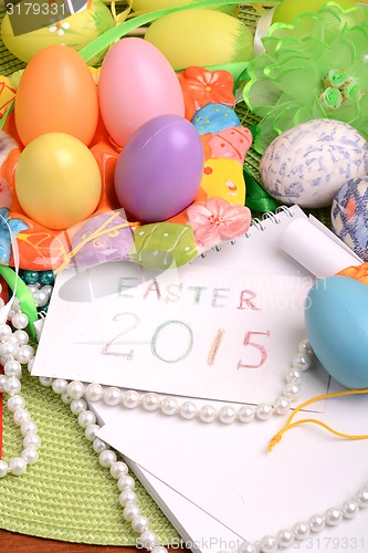 Image of Easter setting with gift box and spring decoration